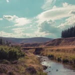 River that runs through a wild valley of the Cairngorms National Park in Scotland
