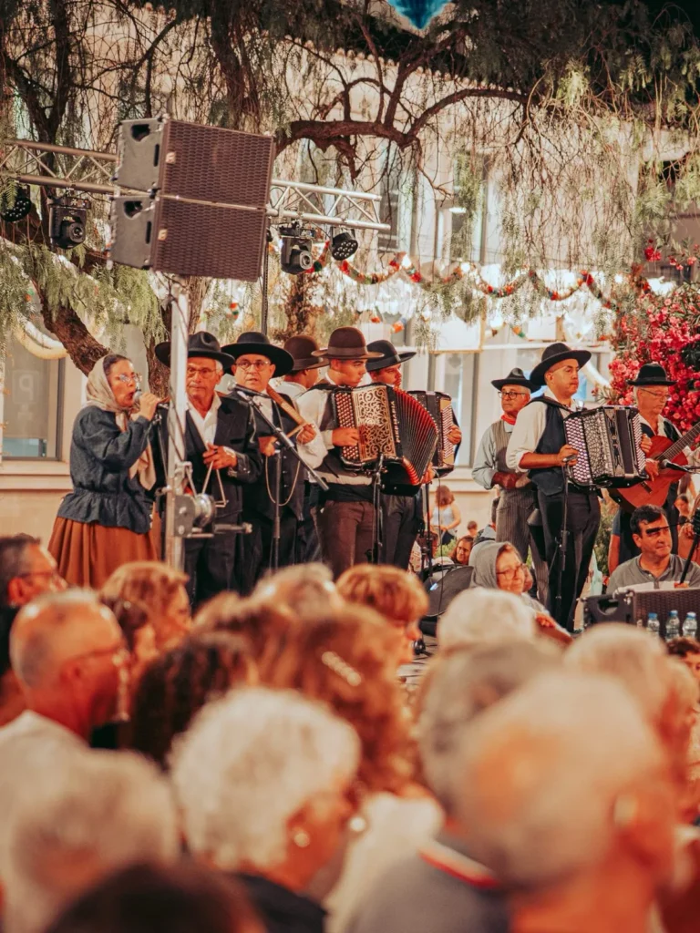 Traditional musicians on stage during the São João at the Tavira garden