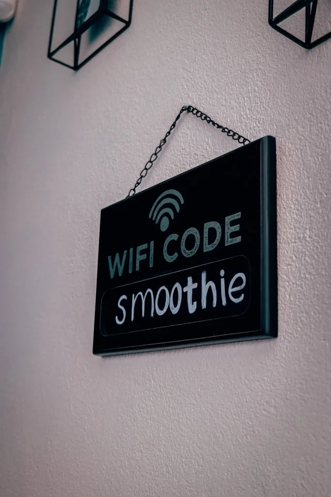 Wall panel indicating the wifi code 'smoothie' in a restaurant, modern atmosphere in Lagos in the Algarve.