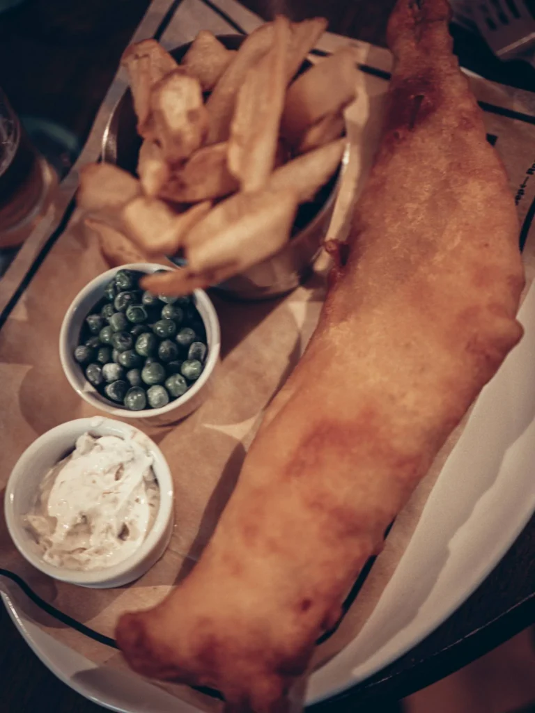 Beer Battered Haddock at Roam West with thick chips, peas and tartare sauce, Xavier's main, in Inchree, Onich.