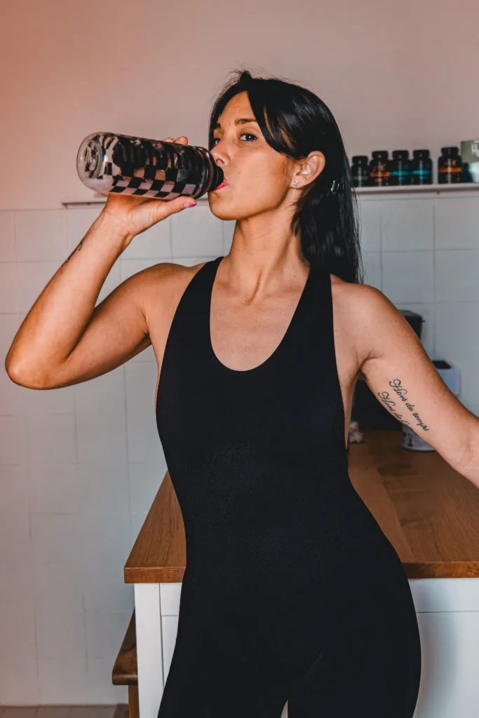 Prozis supplements and water bottle in the kitchen